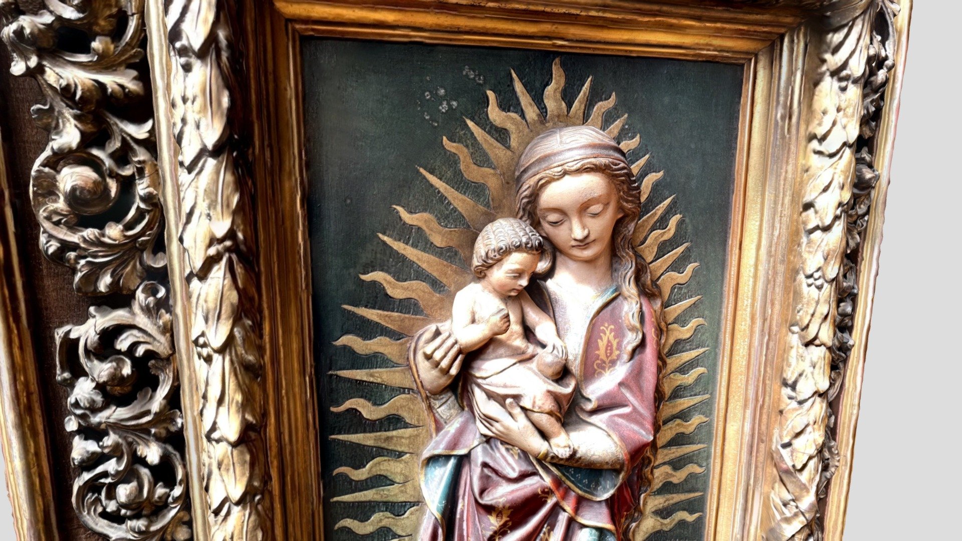 A wooden carved artwork depicting the Virgin Mary and child from Trinity church Coventry

Created with Polycam - Virgin Mary and child wall art - Buy Royalty Free 3D model by blackfirefilms 3d model