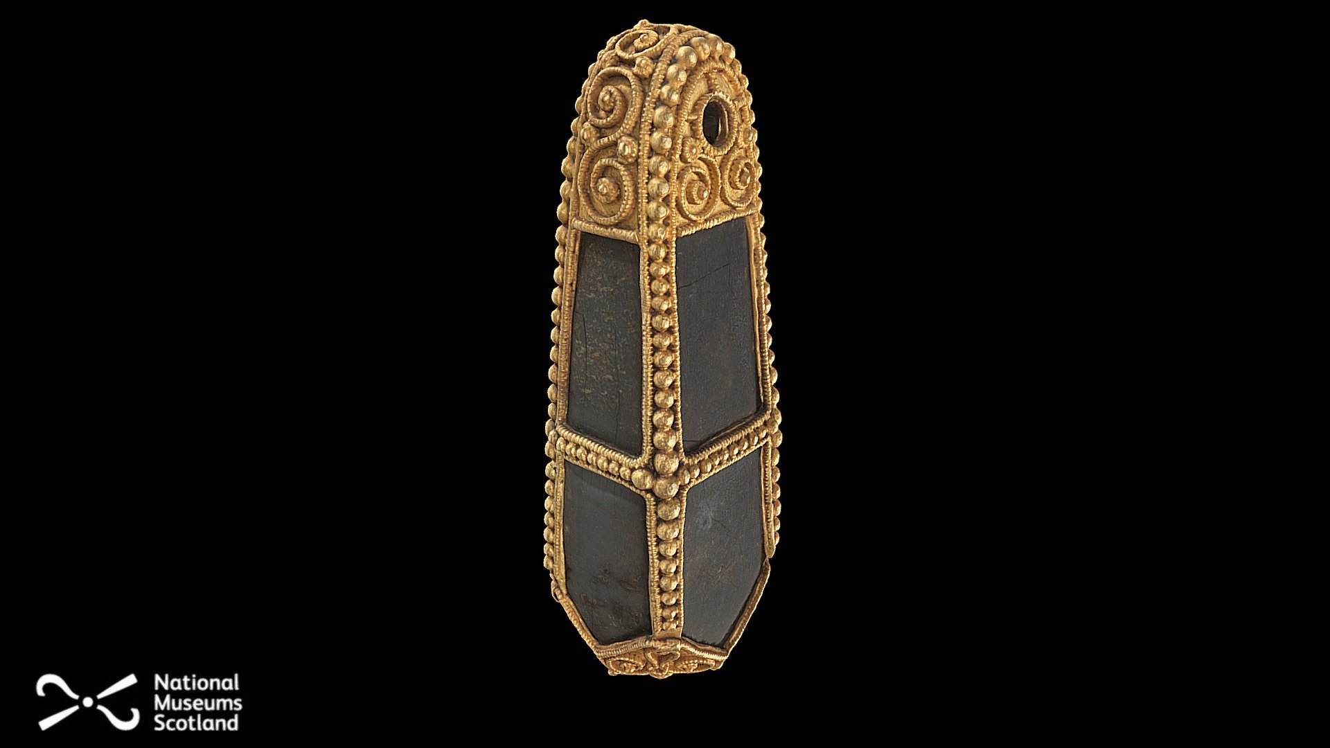 Large pendant containing a carefully shaped metamorphic stone in a gold case decorated with filigree and granulation. 

This object forms part of the Galloway Hoard, the richest collection of rare and unique Viking-age objects ever found in Britain or Ireland. Buried around AD 900, the Galloway Hoard contains over 100 diverse objects, from silver, gold and jewelled treasures to rarely surviving textiles, including wool, linen and Scotland’s earliest examples of silk.

Discover more about the Galloway Hoard: https://www.nms.ac.uk/gallowayhoard

Images: Neil McLean.
Model: Dr Hugo Anderson-Whymark, 2021 - Gold ‘blackstone’ pendant, Galloway Hoard - 3D model by National Museums Scotland (@nationalmuseumsscotland) 3d model
