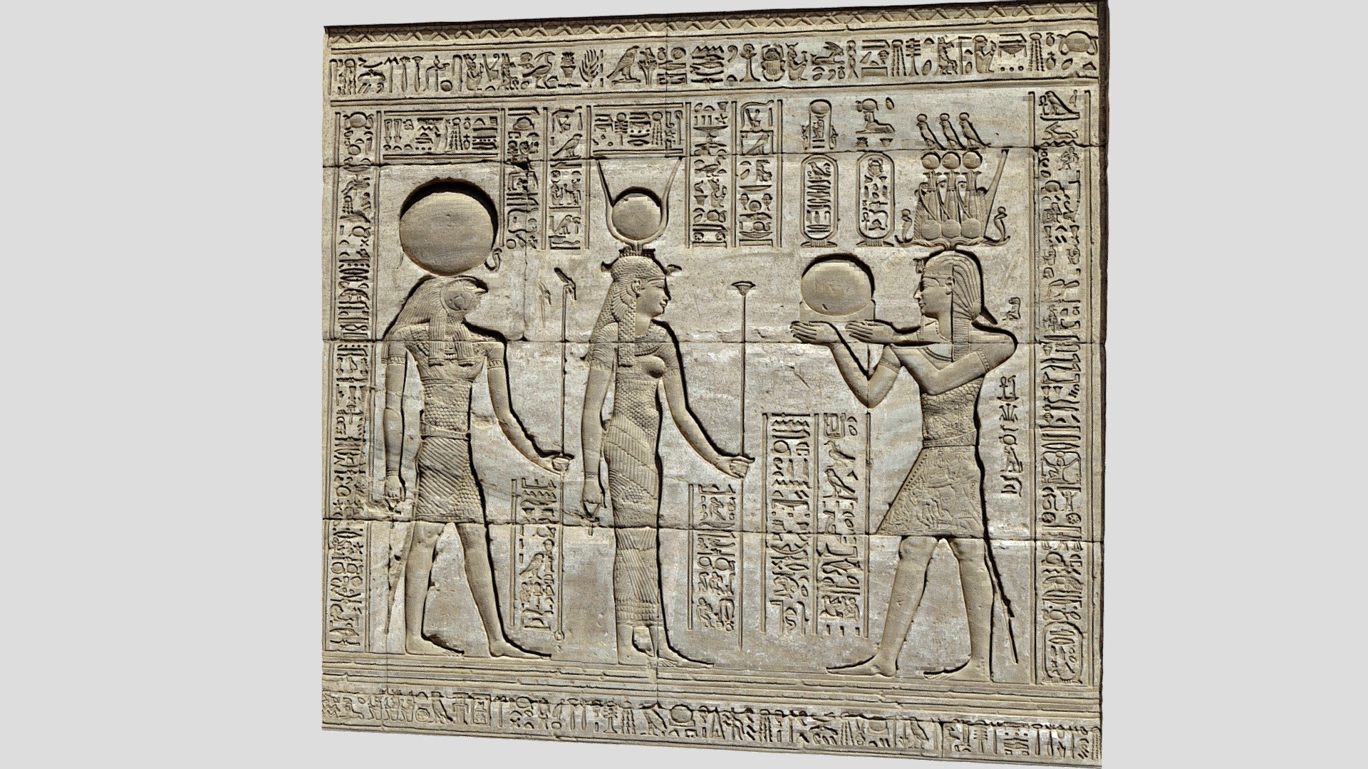 Egypt. Dendera. Temple complex. Roman Birth House of Mammisi. The Roman Emperor Trajan, depicted as a pharaoh and wearing a triple Atef crown, offers an image of the Rising Sun to the goddess Hathor and her husband Horus.Fifth intercolumnar wall. South outer face. Relief.