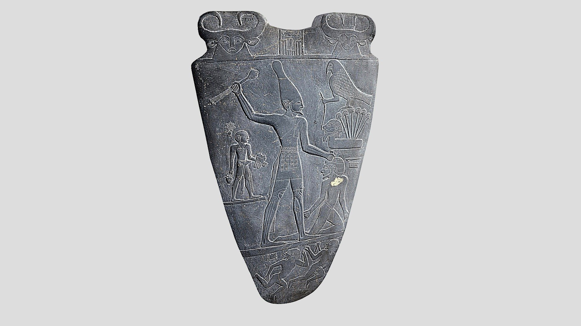 Material:   siltstone
Created 3200–3000 BC (circa)
Discovered  1897–1898
Present location    Egyptian Museum, Cairo
The Narmer Palette, also known as the Great Hierakonpolis Palette or the Palette of Narmer, is a significant Egyptian archeological find, dating from about the 31st century BC, belonging, at least nominally, to the category of cosmetic palettes.

All the information in this link:
https://en.wikipedia.org/wiki/Narmer_Palette
