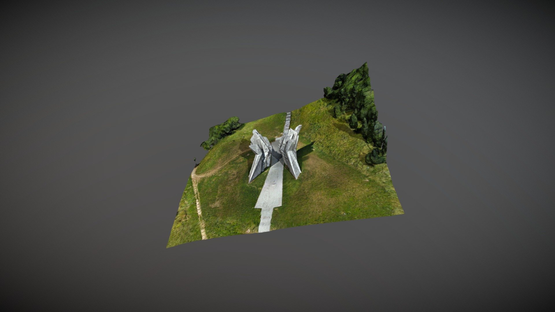 In the mid-1960s, a monument for fallen soldiers of the Battle of Sutjeska was designed by sculptor Miodrag Zivkovic. In the Valley of Heroes, Zivkovic set up a magnificent monument on the top of a hill. The monument enriched the space of the already famous ossuary, built in 1958 by architect Sakeb Hadzihalilovic, with the remaining bodies of 3301 Partisan soldier who died in the Schwarz operation. After two years of construction, Zivkovic's monument was ceremoniously opened in 1972. 

Wings of victory are placed on the top of the hill so that the entire valley of the Sutjeska River can be seen. The valley, bearing blood and suffering of less than a century old battle, is now protected by a magnificent white monument. On the one hand, all of the monument's representativity is attained by the environment and nature itself, but on the other hand, any man walking by it will be left curious.