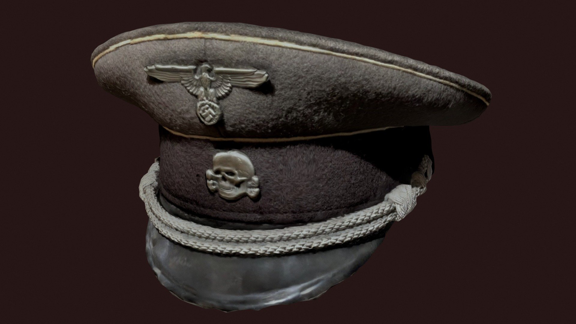 A scan of a WW2 hat.
Its fairly unedited but for game use it would be best to reduce the polygon count