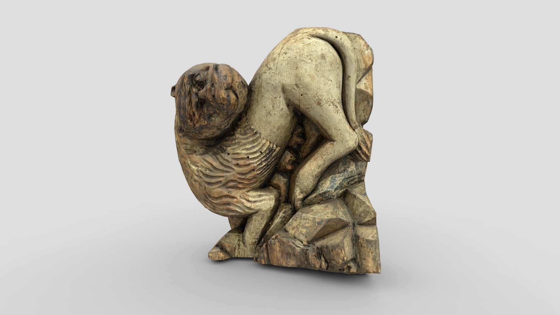 Sculpture of a Lion

In folk sculpture, animal figures were rarely independent works. Mostly they were part of the decoration of the royal gates and floor candle holders, as well as symbols of the Gospel writers. The image of a lion as a heraldic symbol is most common. In wooden folk sculpture, the lion was depicted not as a formidable king of beasts, but rather as a good-natured one. In this sculpture, the carver tried to depict, in a primitive manner, the animal’s characteristic features, in particular a bend of its back, a tail with a tassel, and a shaggy mane, alluding to it with the help of rhythmic carved wavy lines 3d model